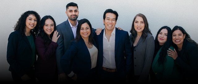 The eight people of the firm, photographed together